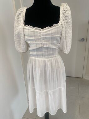 Heartloom White Embroidered
Eyelet Puff Sleeve Mini Dress Women's
SIZE LARGE